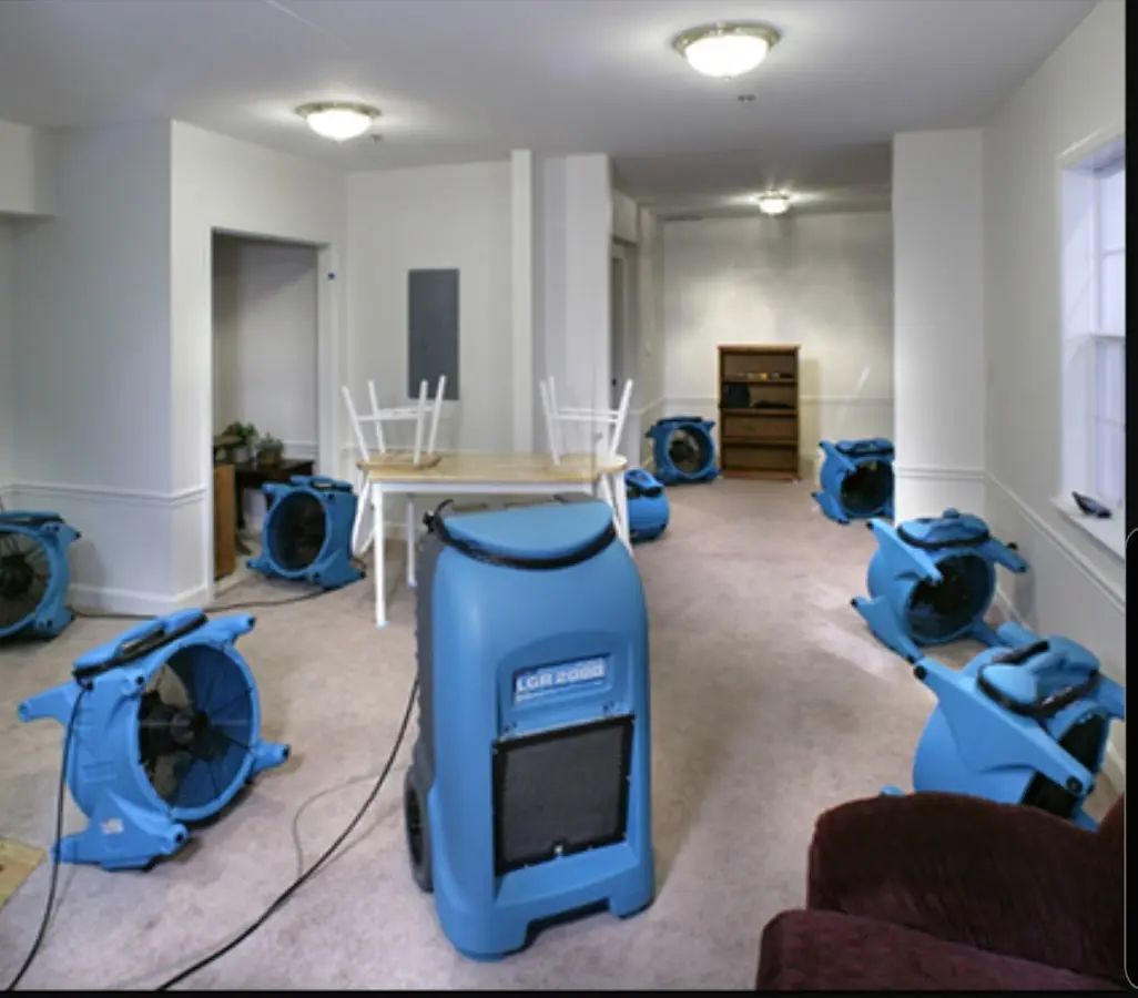 Air movers and dehumidifier setup for Water Extraction & Removal in Moline